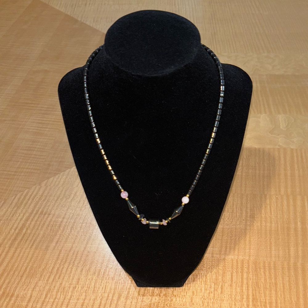 Chic Black and Gold Necklace with Pink Accents